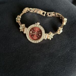 Women's Rose Gold-Tone Bracelet Watch with Red Dial and Crystal Accents